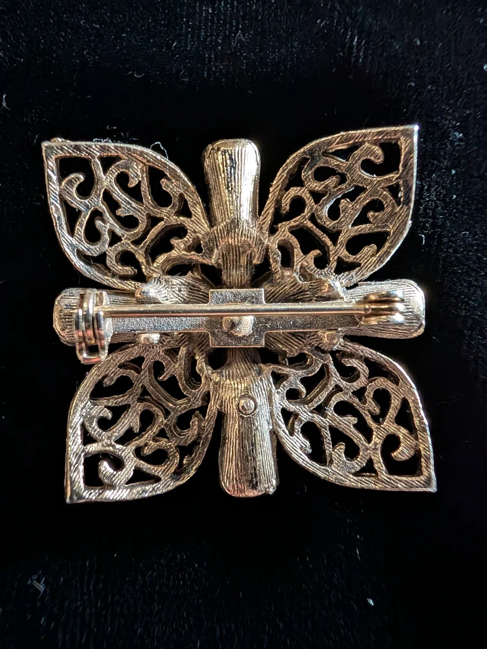 Gold-Tone Floral Brooch with Blue Stones